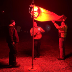 ASCIs determine wind direction using a wind sock.