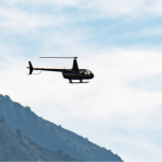 Helicopter over mountains
