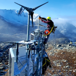 Tech repairs weather cam on mountain in Alaska (photo: FAA)