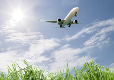 Aircraft flying over a field