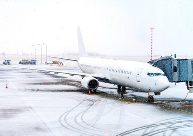 Image of aircraft on snowy tarmac