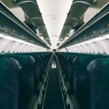 Empty airplane aisle